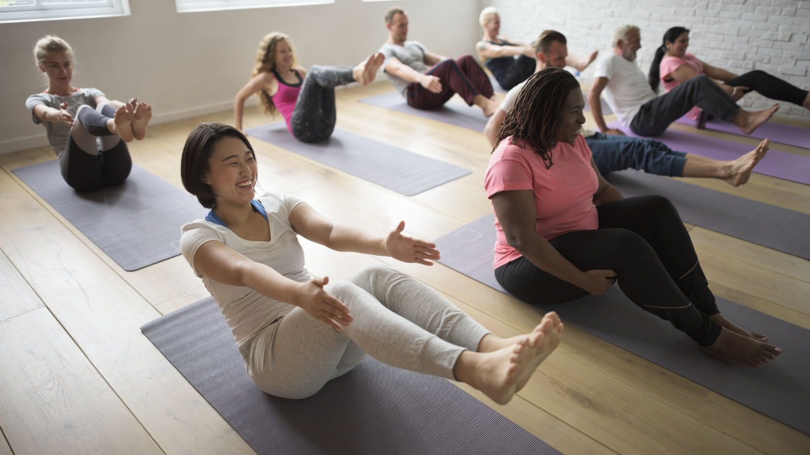 Yoga class, wellness, self-care and happiness.