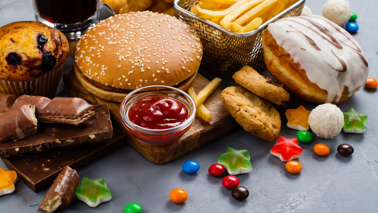 Assortment of unhealthy products that's bad for figure, skin, heart and teeth. Fast carbohydrates food