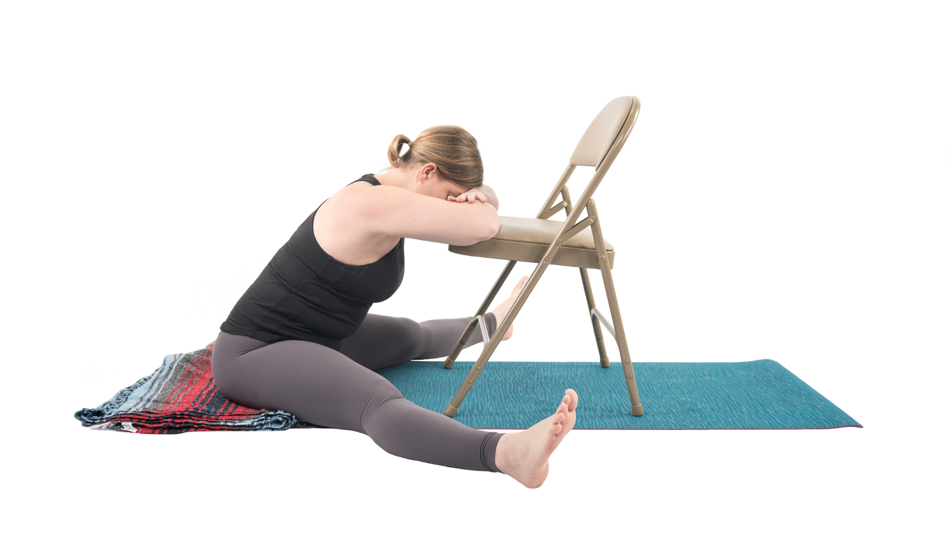 Upavista Konanasana is a forward fold practiced here with props