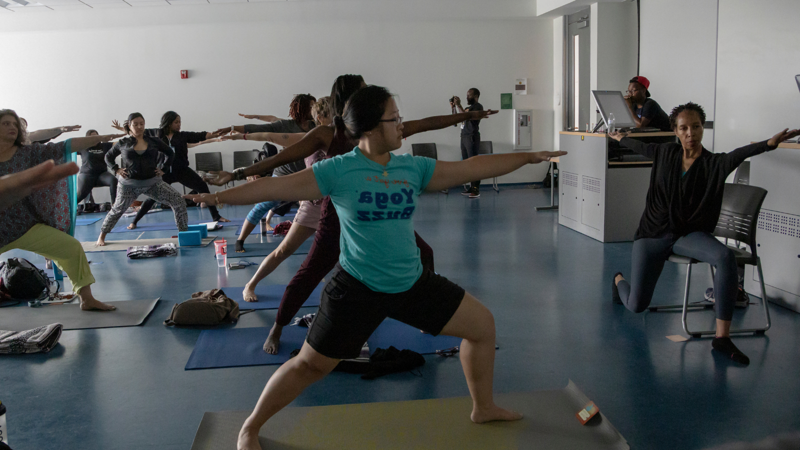 Providing yoga pose variations. chair yoga, providing props and chairs in yoga class, accessibility for all yoga students
