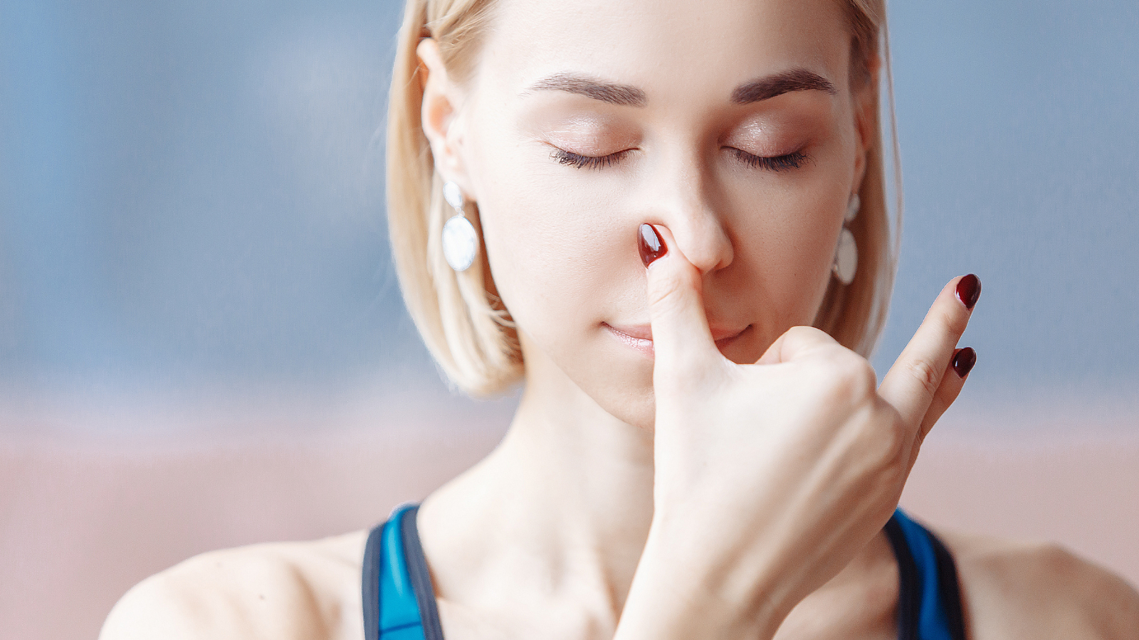 How to practice Nadi Shodhana (Alternate Nostril Breathing) to help reduce the effects of tension headaches