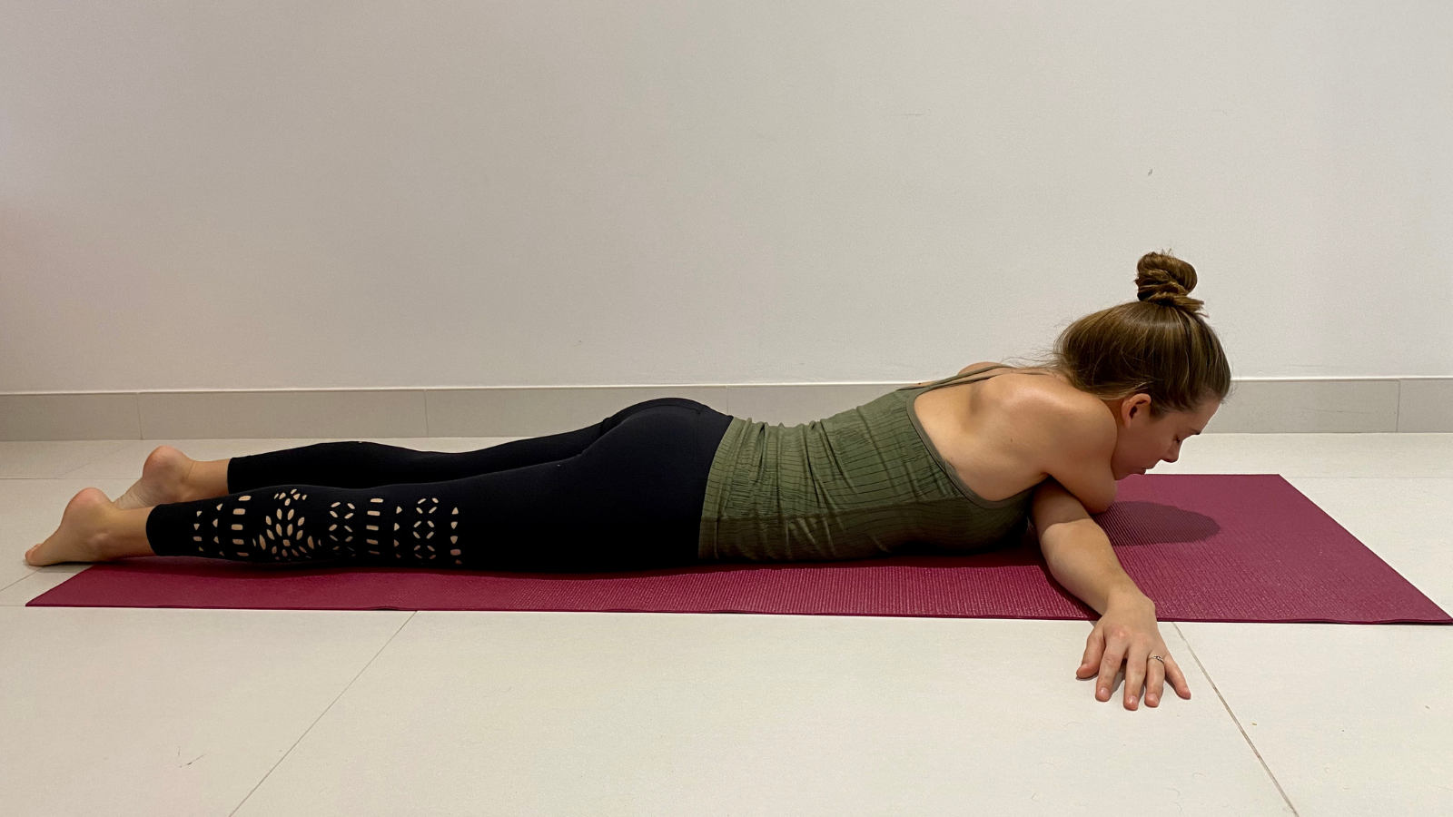The benefits of practicing Bow Tie yoga Pose to help alleviate the symptoms of back pain