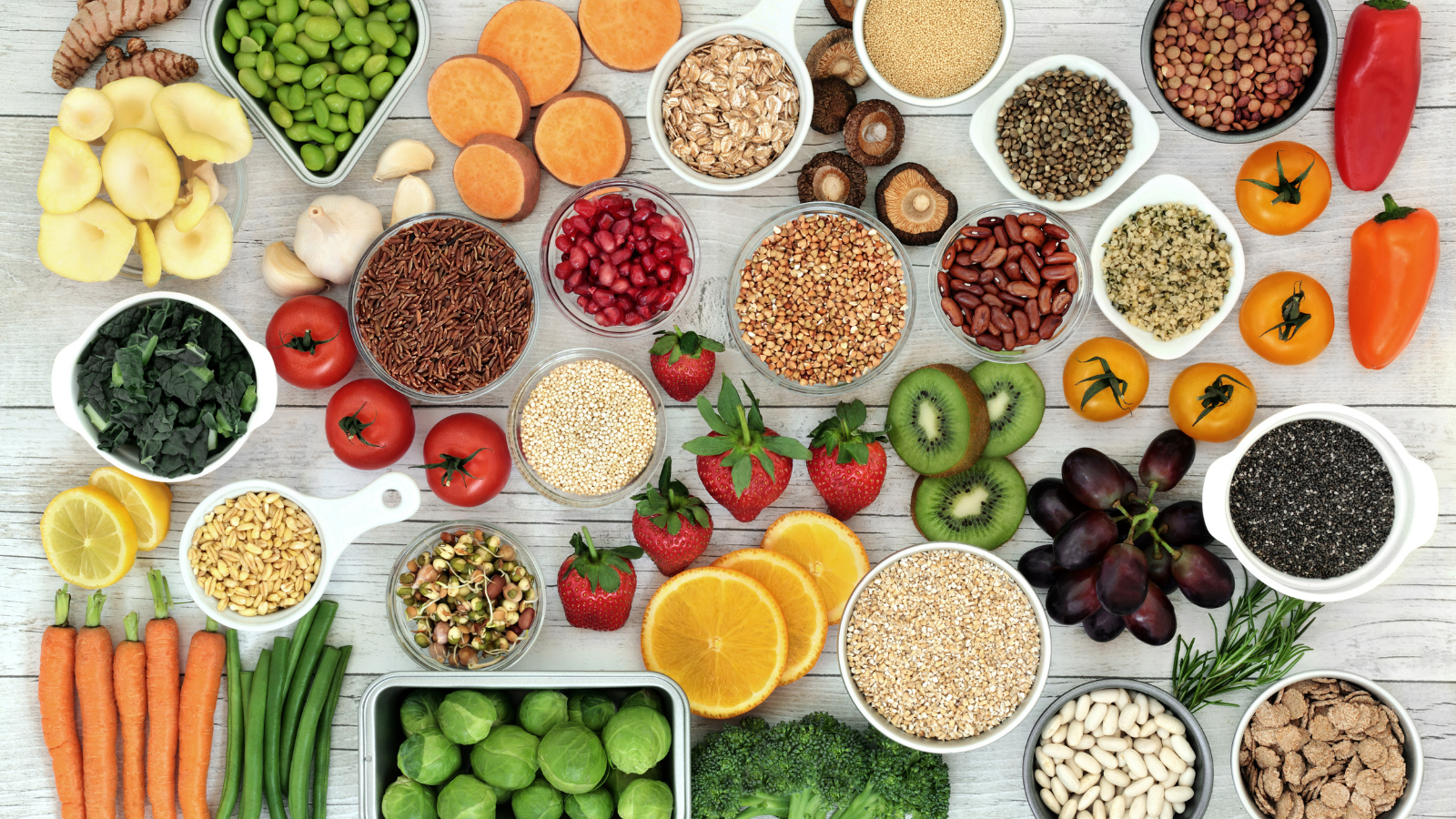 Fresh superfood concept with fruit, vegetables, grains, cereals, pulses, seeds, herbs and spices