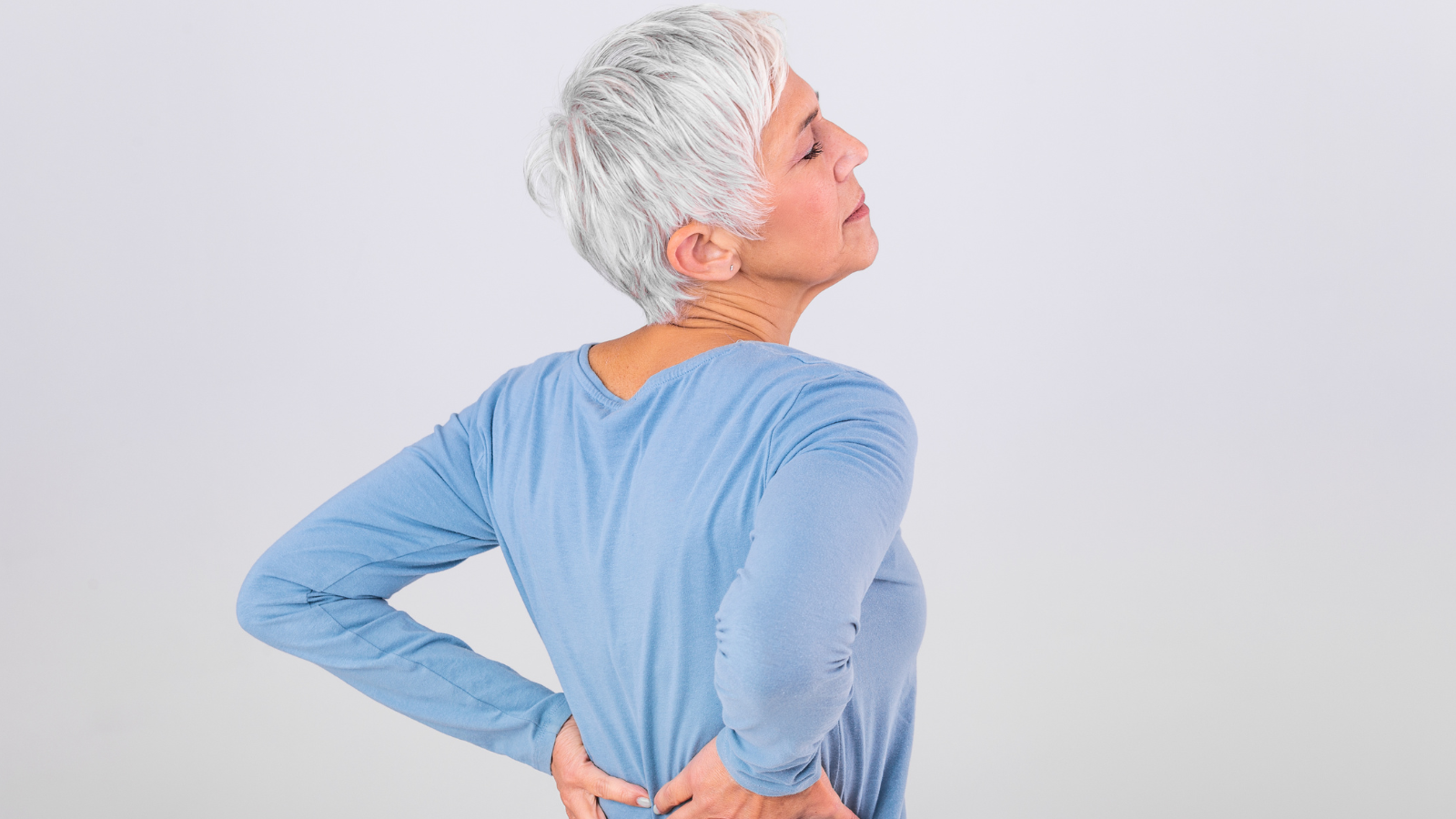 Mature Woman suffering from lower back pain