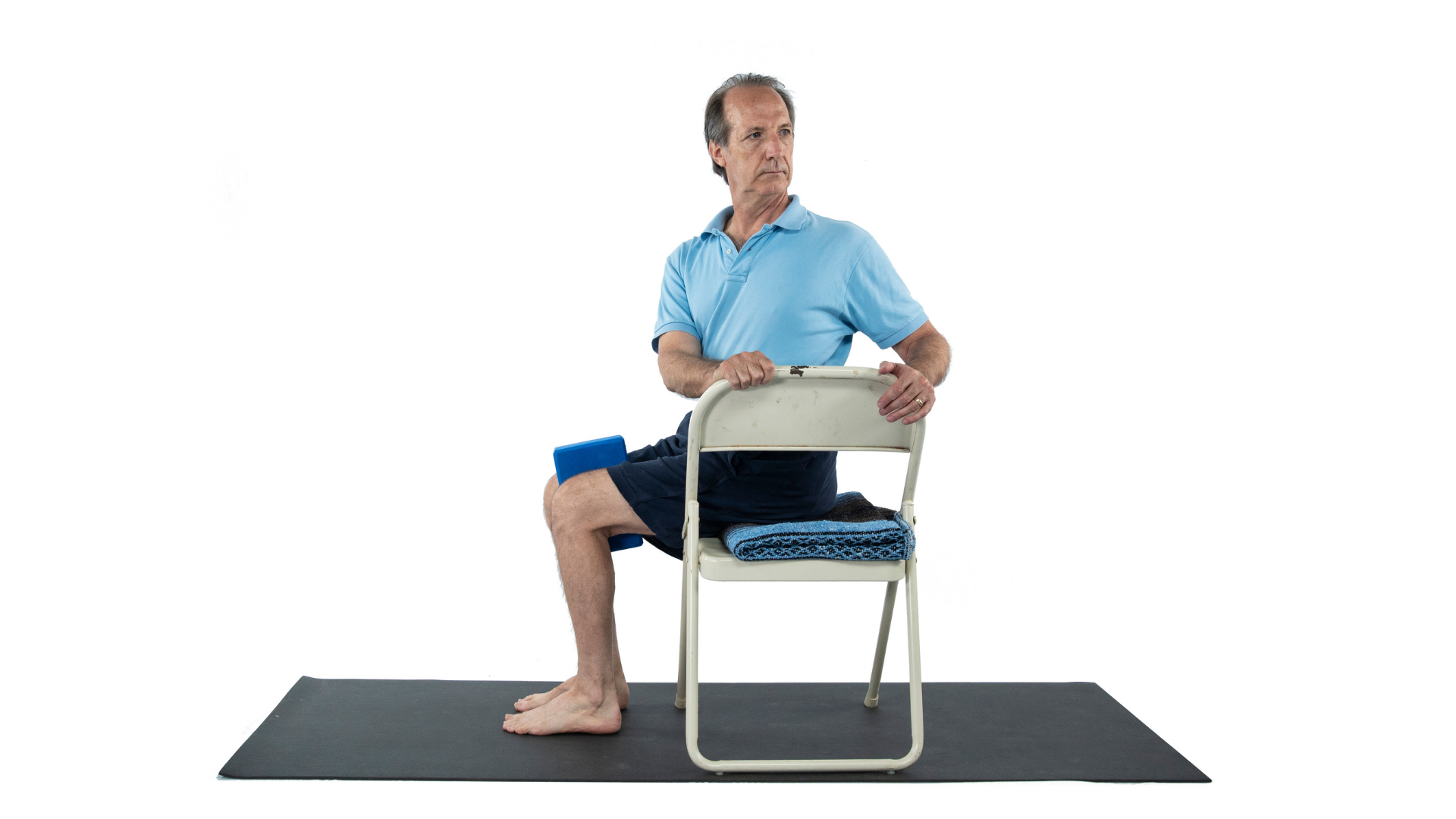 Marichyasna Pose or Seated Twist Pose.