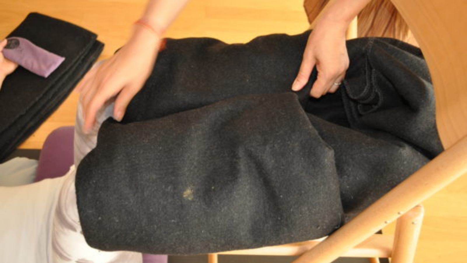 Image depicts a footwrap made with yoga blankets to use in restorative poses such as Instant Maui.