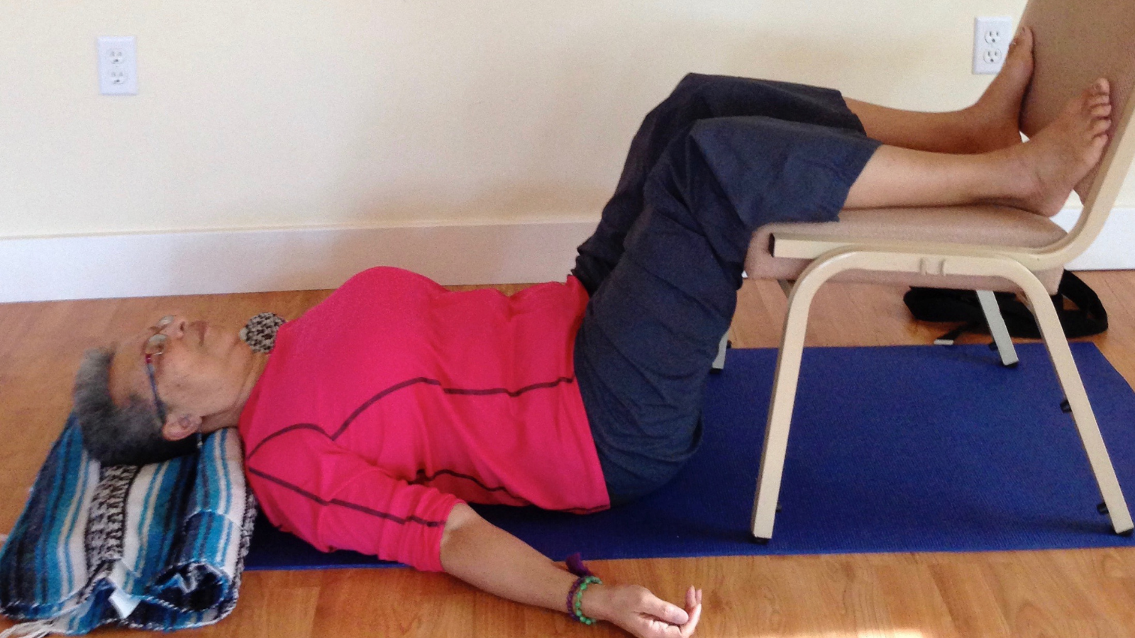 Legs on the Chair Pose -- a variation on Legs up the Wall Pose which is a calming and stabilizing yoga pose