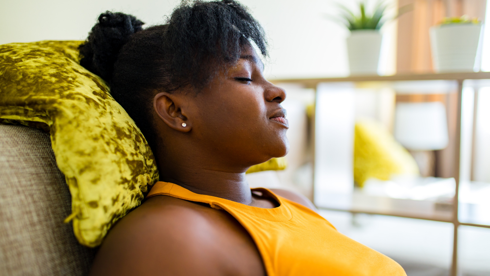 yoga student enjoying the benefits of rest on her nervous system