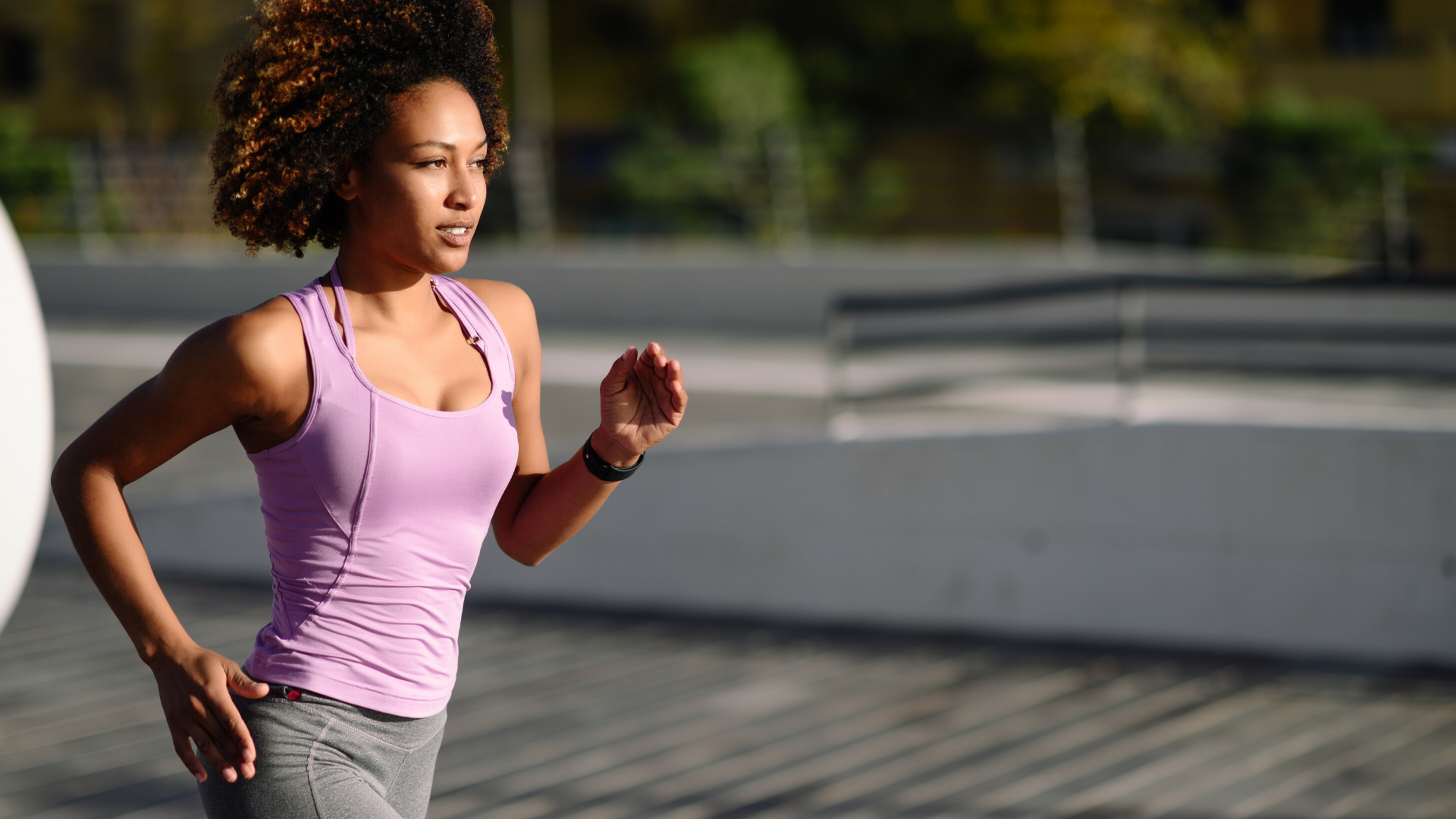 Woman running outside.