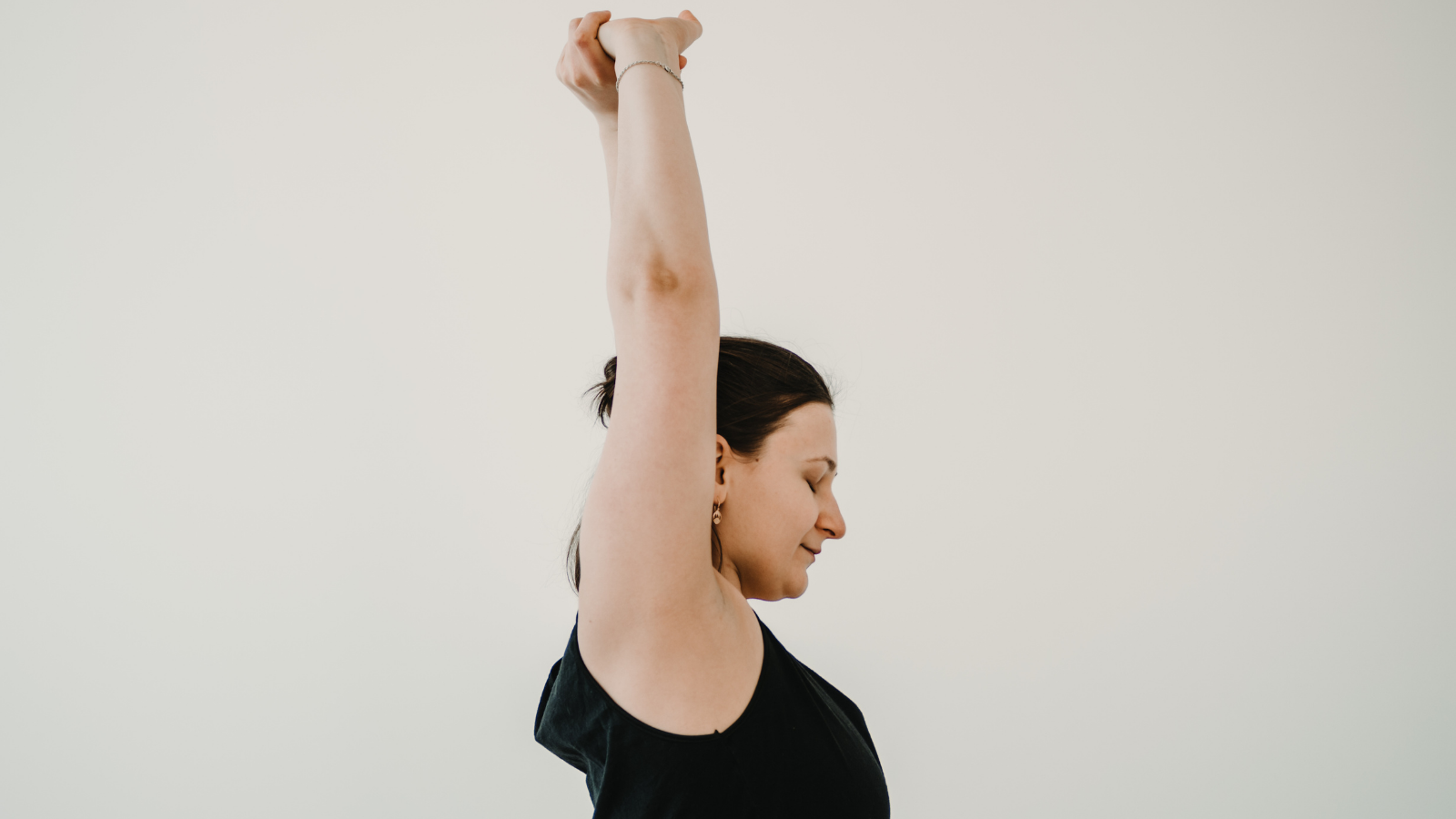 Seated Arms Overhead Pose a variation of the standing pose