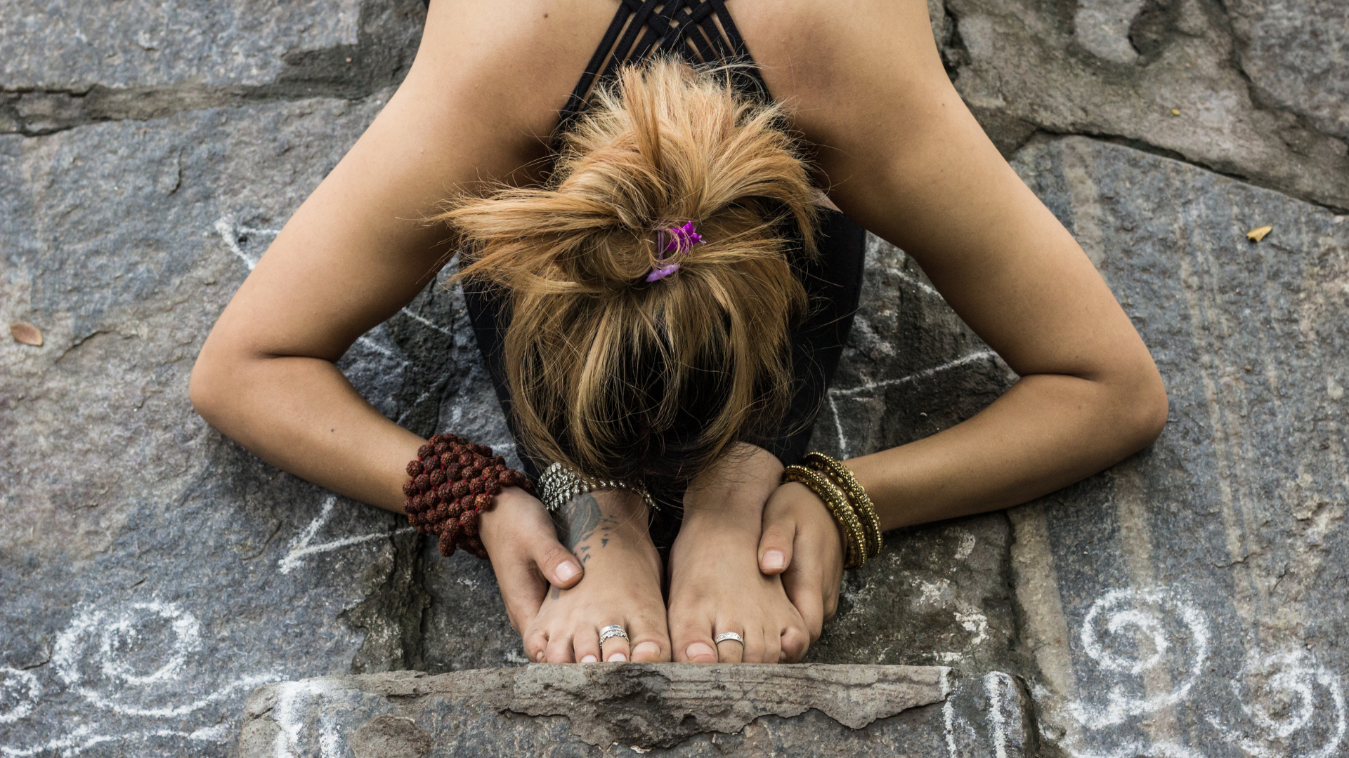 The Forward Folding  yoga image depicts the quiet folding inward to find the layers of self-awareness.