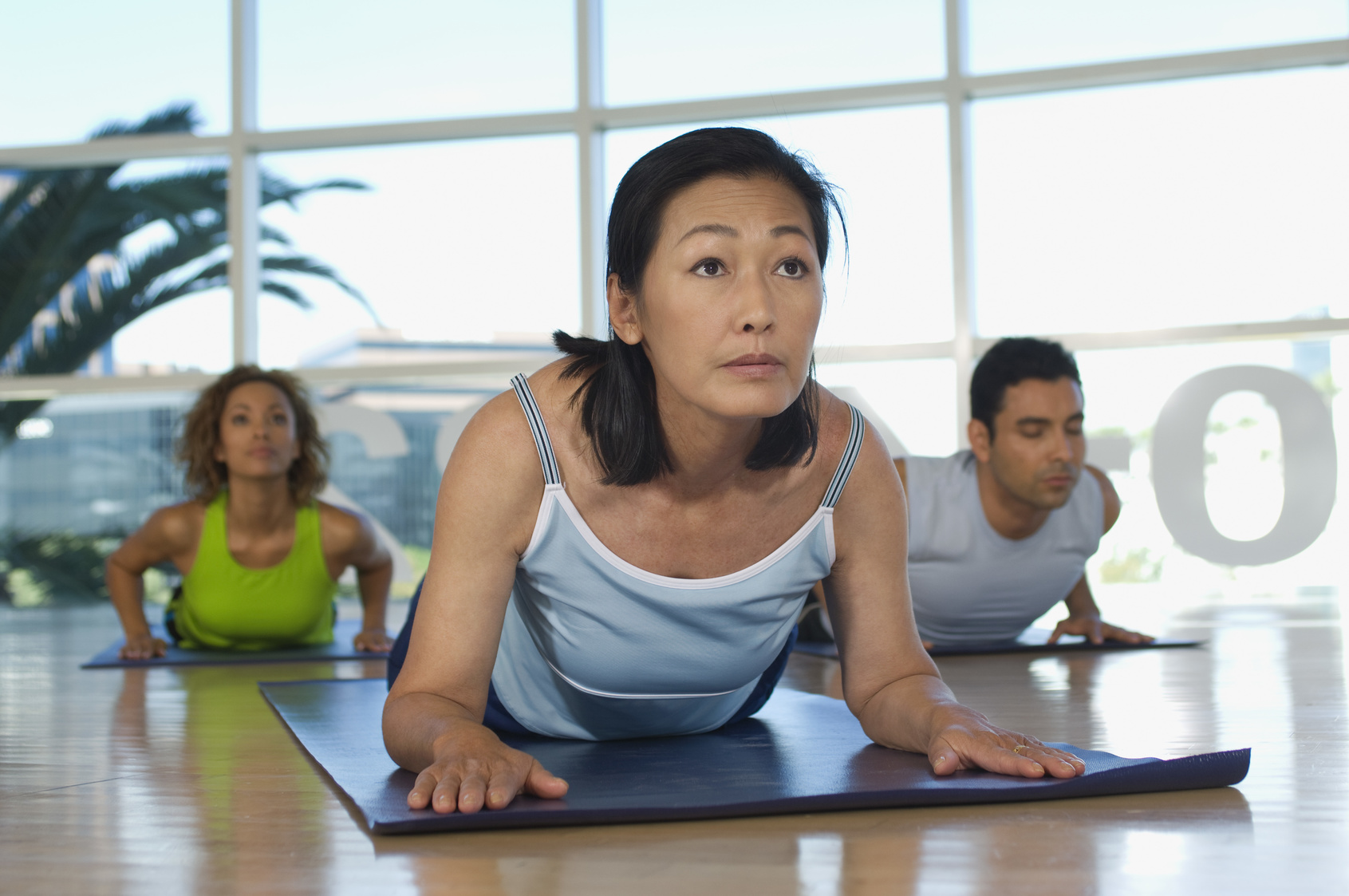 group of diverse people practicing yoga group of diverse people practicing yoga