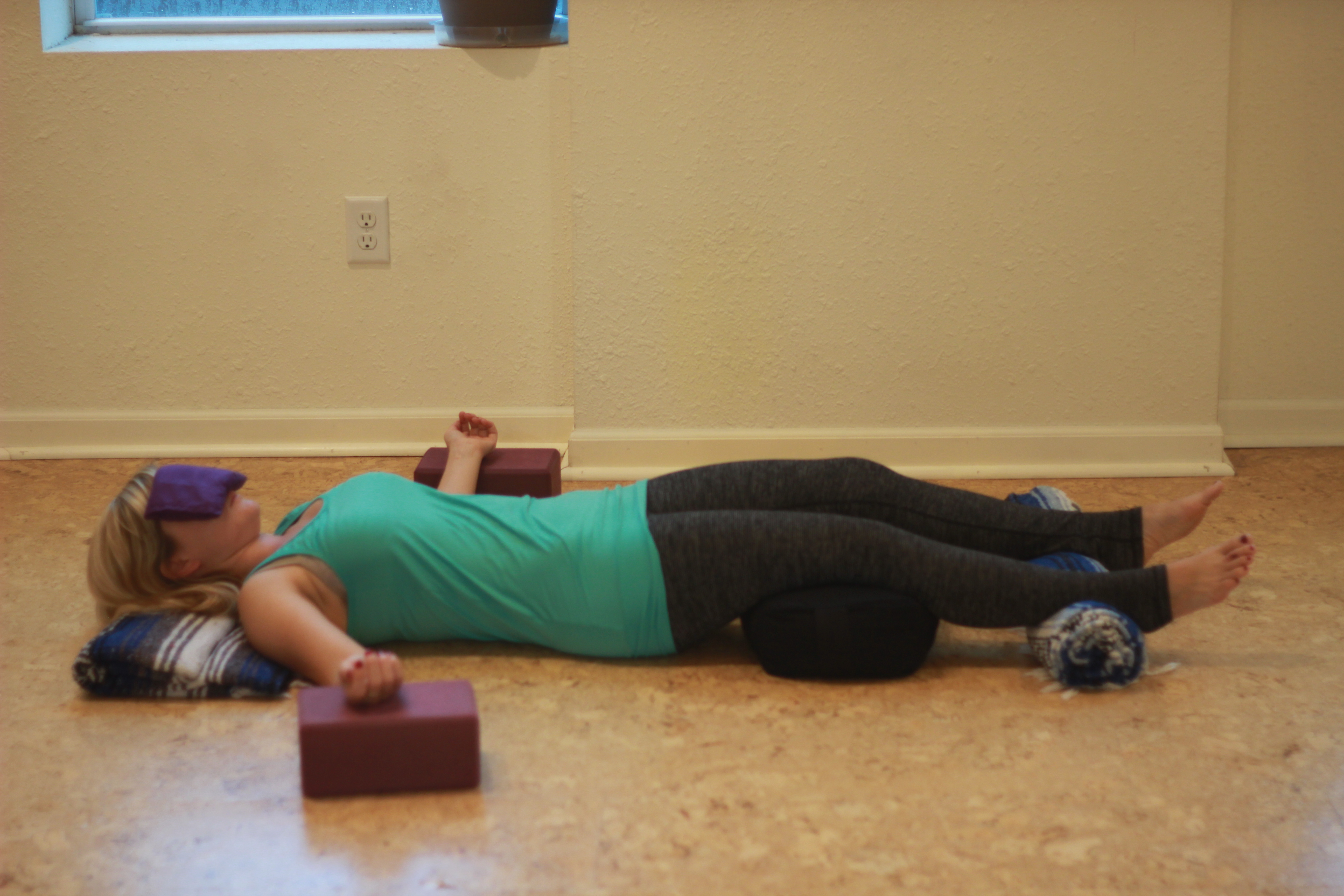 Relaxation Pose (Savasana) with props
