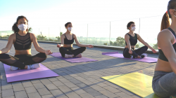 Yoga class practicing safely and mindfully during COVID-19