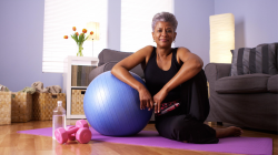 Older beginner yoga student practicing yoga for menopause support