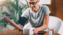 Senior Woman Measuring Blood Pressure at home