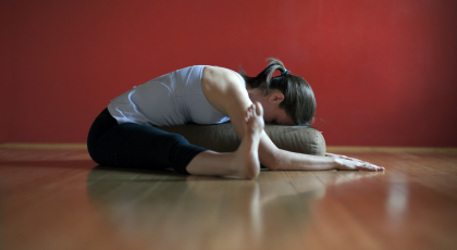 Restorative Forward Fold with Props to help restore the body to rest-and-digest mode