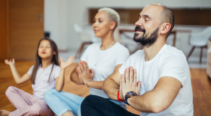 Family togetherness and gratitude hands are in Anjali Mudra Prayer Position cultivating aparigraha