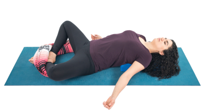 Supta Baddha Konasana a restorative pose with props.