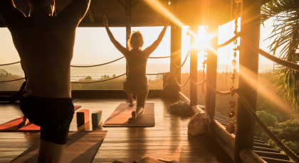 Yoga students practicing the yogic principles of slowing down and appreciating the moment
