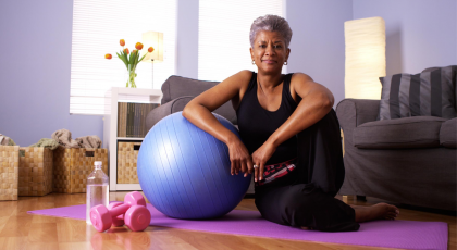 Older beginner yoga student practicing yoga for menopause support
