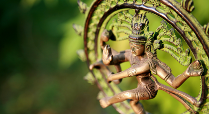 A statue of Shiva Nataraja - Lord of Dance in the sunlight.