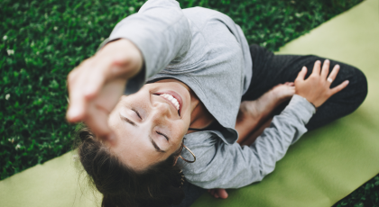 older_beginner_yoga_student_enjoying_a_home_yoga_practice