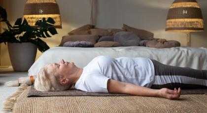 How to use a yoga eye pillow to support the neck in Corpse Pose (Savasana) for rest and relaxation