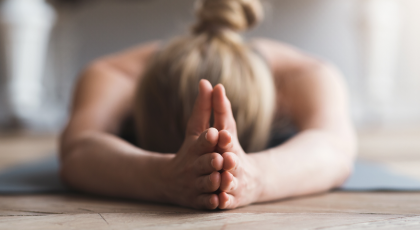 Close up of womans hands in prayer.