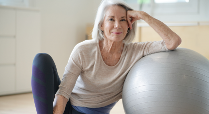 older_yoga_student_getting_beginner_practice_tips