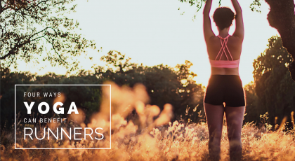 runner doing yoga stretch arms overhead
