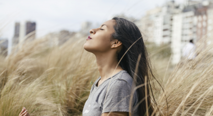Woman practicing yoga for chronic pain breathing