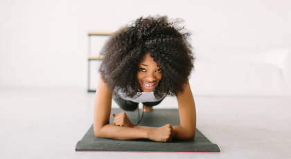 Woman in Plank Pose (Phalakasana) yoga to reframe negative thinking