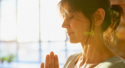 yoga woman in namaste pose 