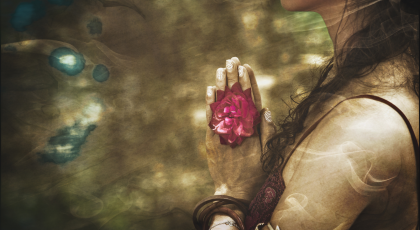 woman practicing prayer or meditation, exploring the Chakras, energy anatomy