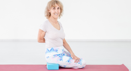 Woman practicing yoga for joint inflammation Hero's Pose (Virasana)