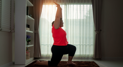 Yoga woman for lower back pain in Low Lunge Pose (Anjaneyasana)