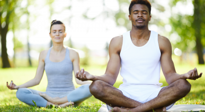 Yoga students practicing mindful mediation for depression