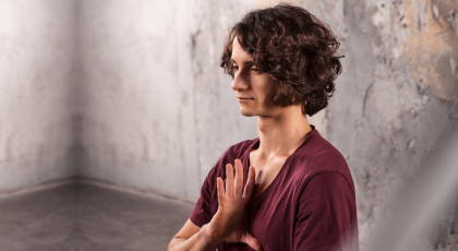 Man finding calm in meditation pose