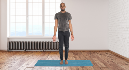 Man practicing yoga for feet in Mountain Pose (Tadasana)