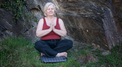 Woman practicing yoga in seated pose the 5 koshas