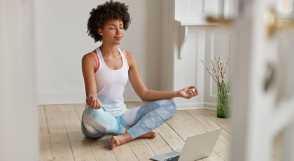 Woman practicing yoga the NAP meditation