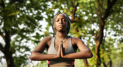 Woman practicing yoga for low back pain