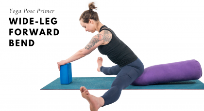 woman practicing upavista konasana, wide-leg forward bend yoga pose