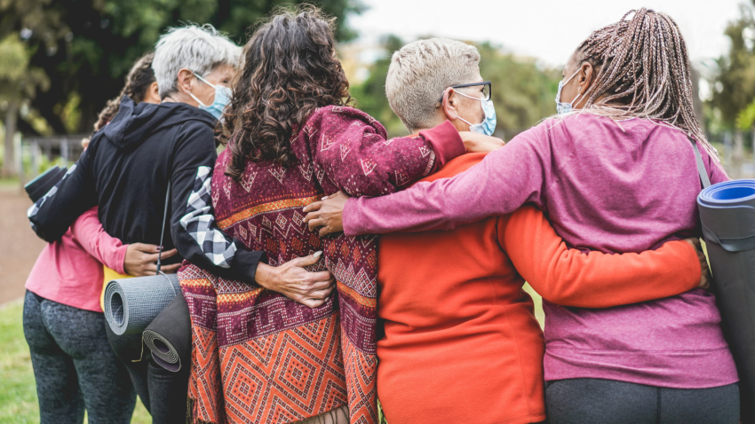 Culturing friendships and empathetic joy for other peoples happiness. Multi generational women having fun before yoga class.