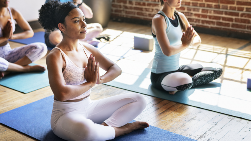 How to practice yoga and other calming practices to tone vagal health and wellbeing Yoga student and calming practices that help regulate vagal nerve response