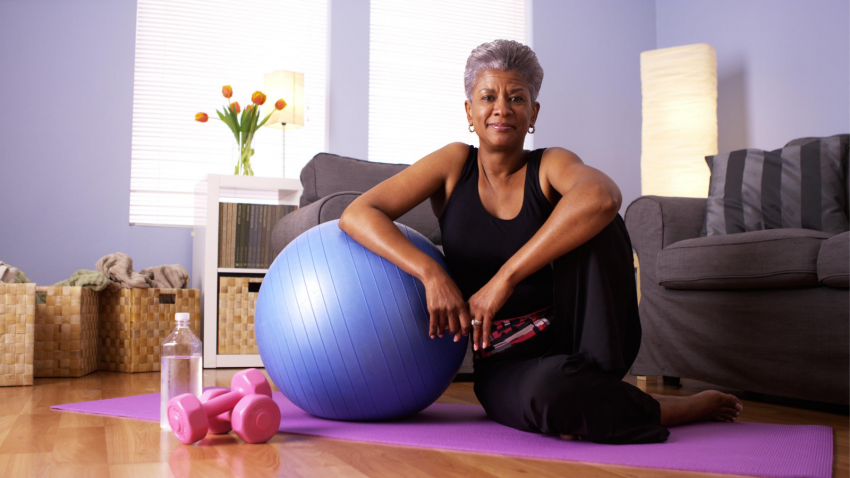 Older beginner yoga student practicing yoga for menopause support