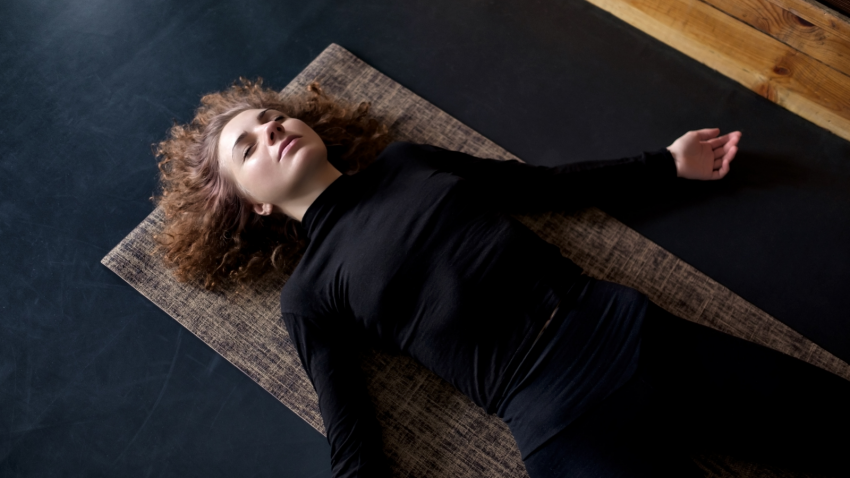 The benefits of practicing Savasana restorative yoga pose to reduce stress and improve sleep