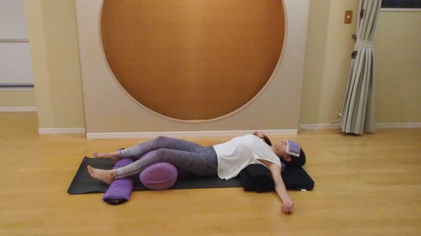 Image depicts the Restorative Mountain Brook Pose for deep relaxation and support.