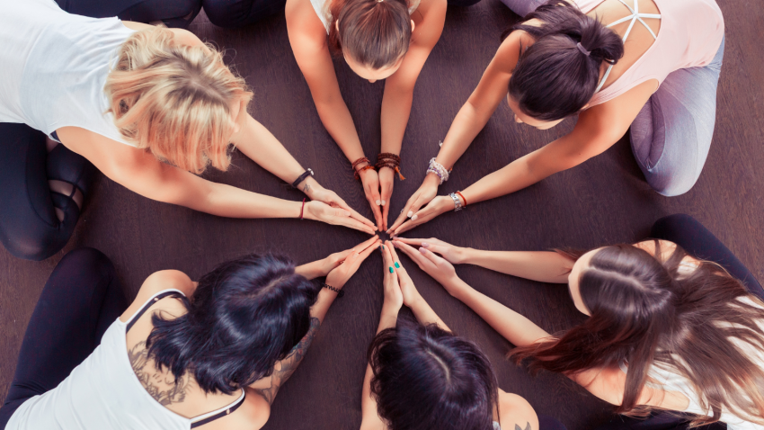 Yoga wellness tips to practice sustainability and learn from past challenges and grow in the new year Yoga class practicing sustainability or the yogic principle of aparigraha or non-greed